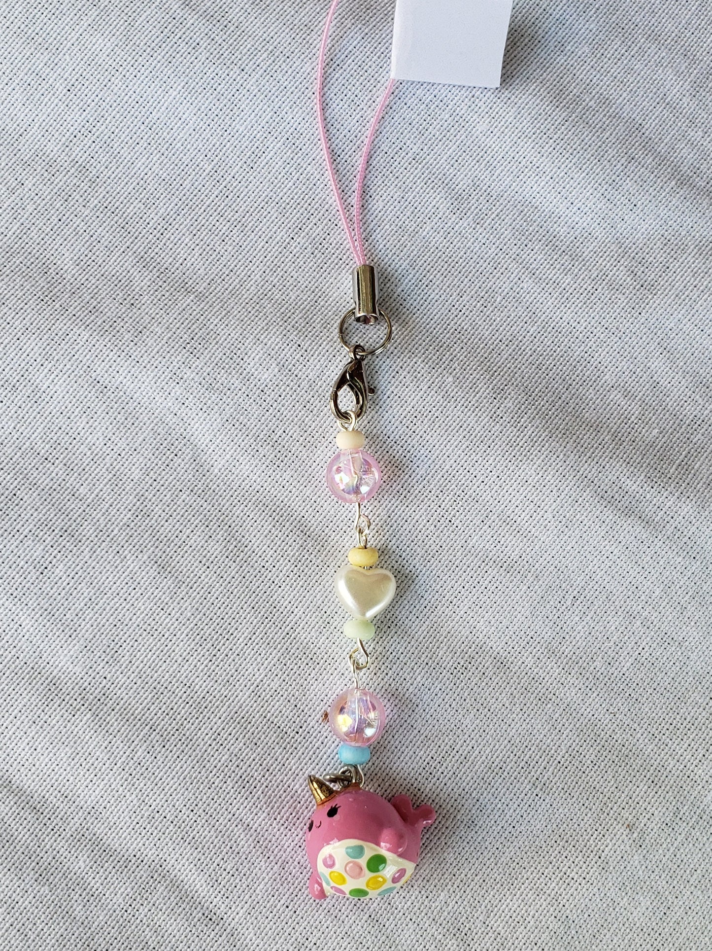 Pink narwhal phone charm